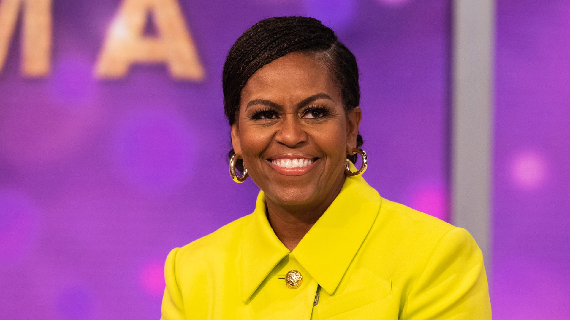 photo of michelle obama in yellow suit