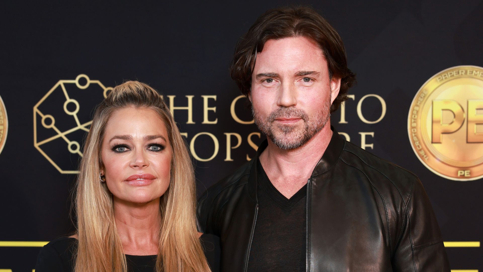 Denise Richards and Aaron Phypers attend the "Paper Empire" Tv Show Event at Annex Beach on April 18, 2023 in Cannes, France