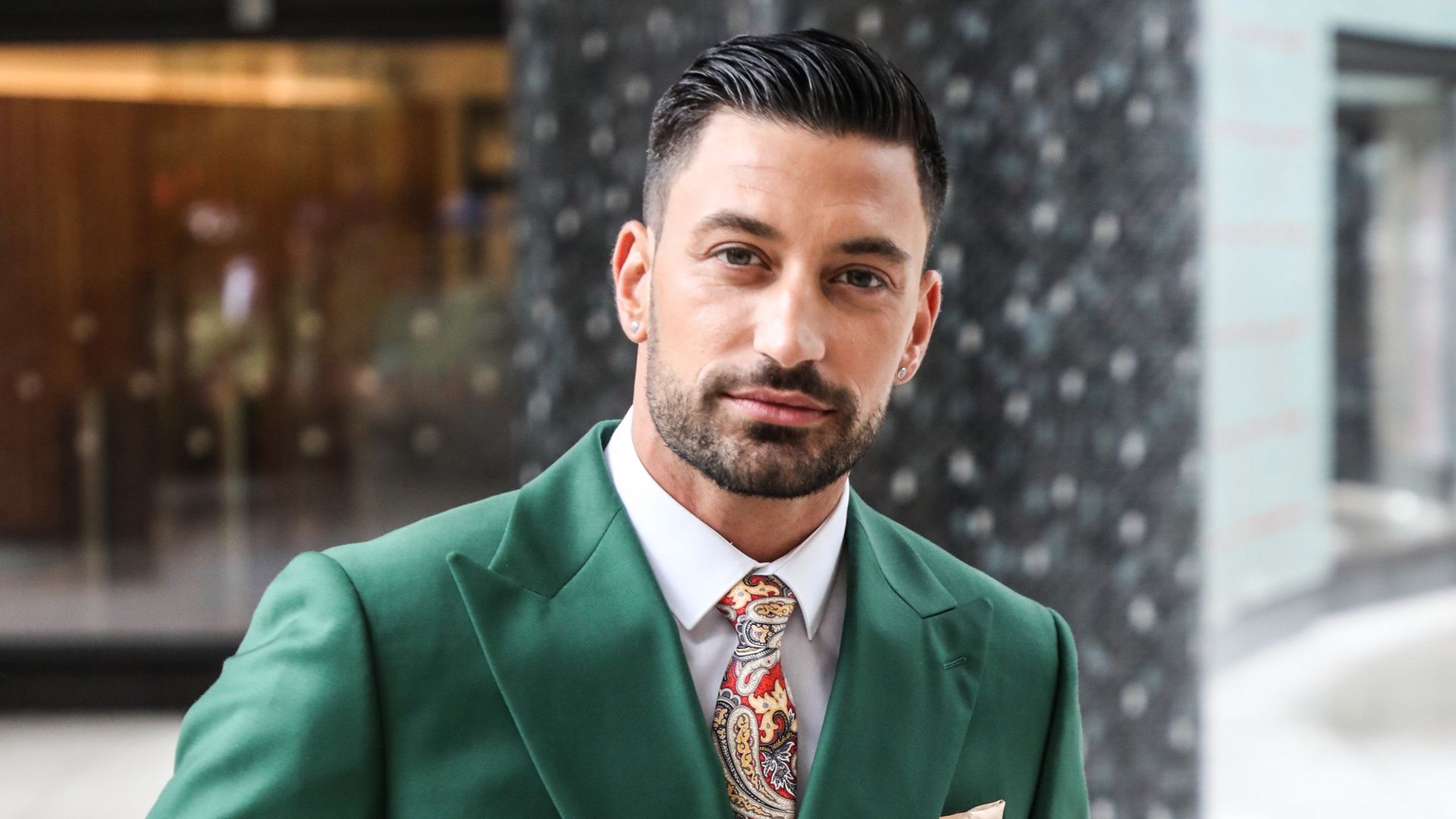Giovanni Pernice in a green suit
