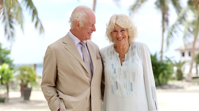 Charles and Camilla on a beach