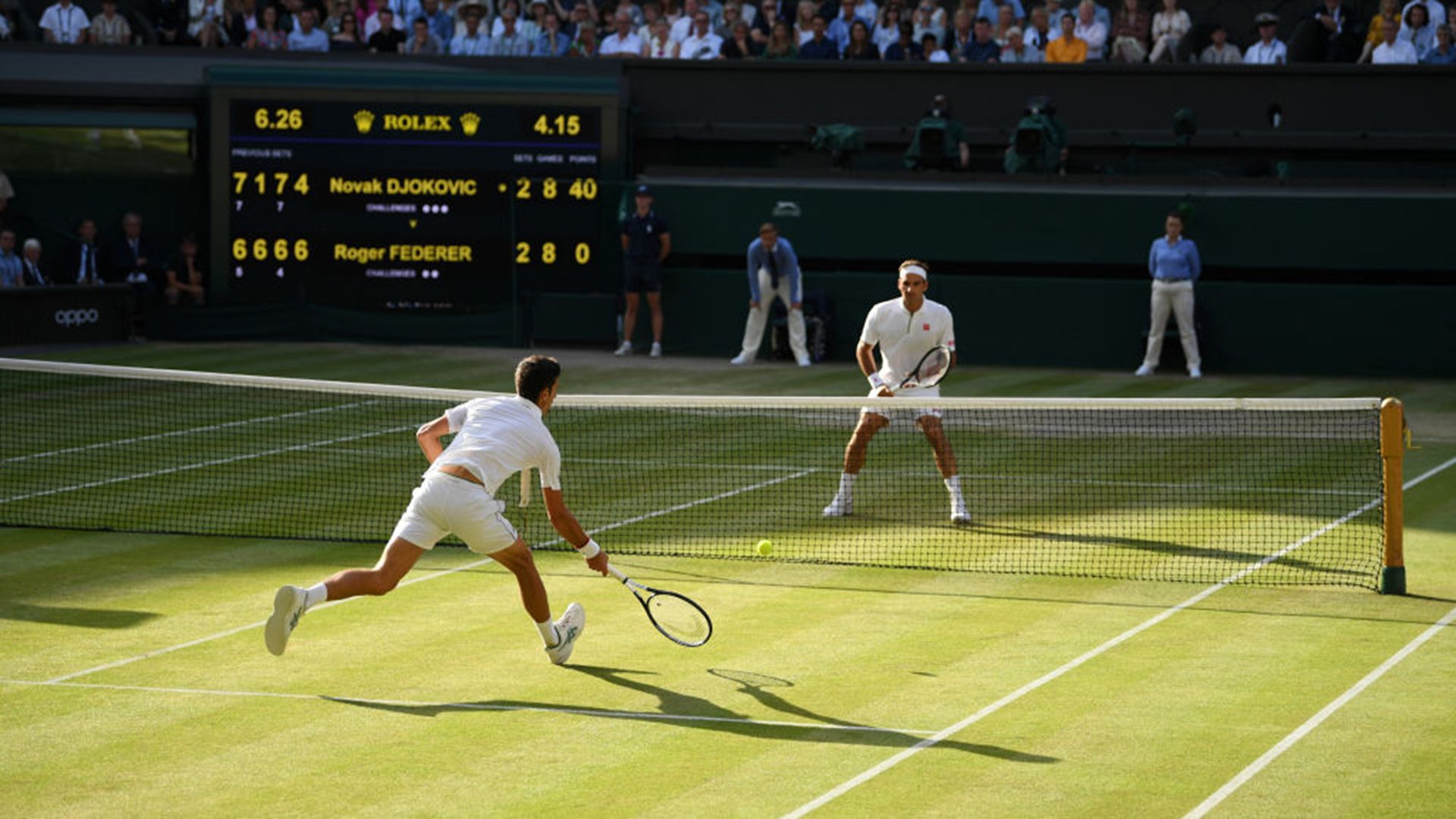 Novak Djokovic of Serbia plays a forehand in his Men's Singles final against Roger Federer of Switzerland during Day thirteen of The Championships - Wimbledon 2019