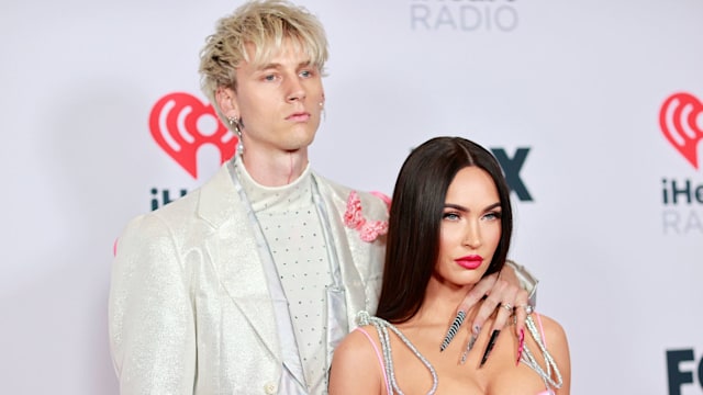 Machine Gun Kelly and Megan Fox attend the 2021 iHeartRadio Music Awards at The Dolby Theatre in Los Angeles, California, which was broadcast live on FOX on May 27, 2021