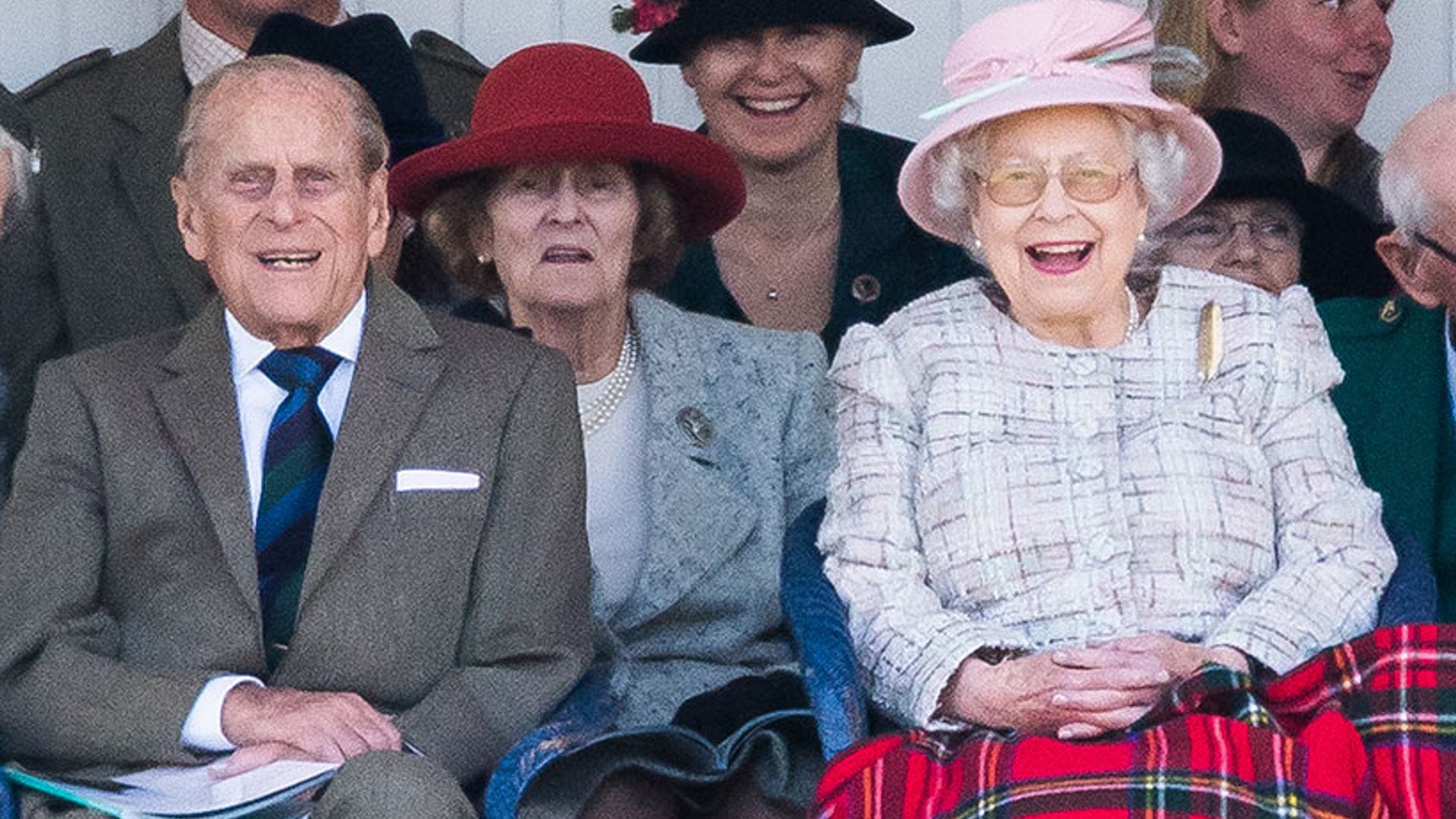 The Queen and Prince Philip happily reunite in public after Philip's absence at Trooping the Colour