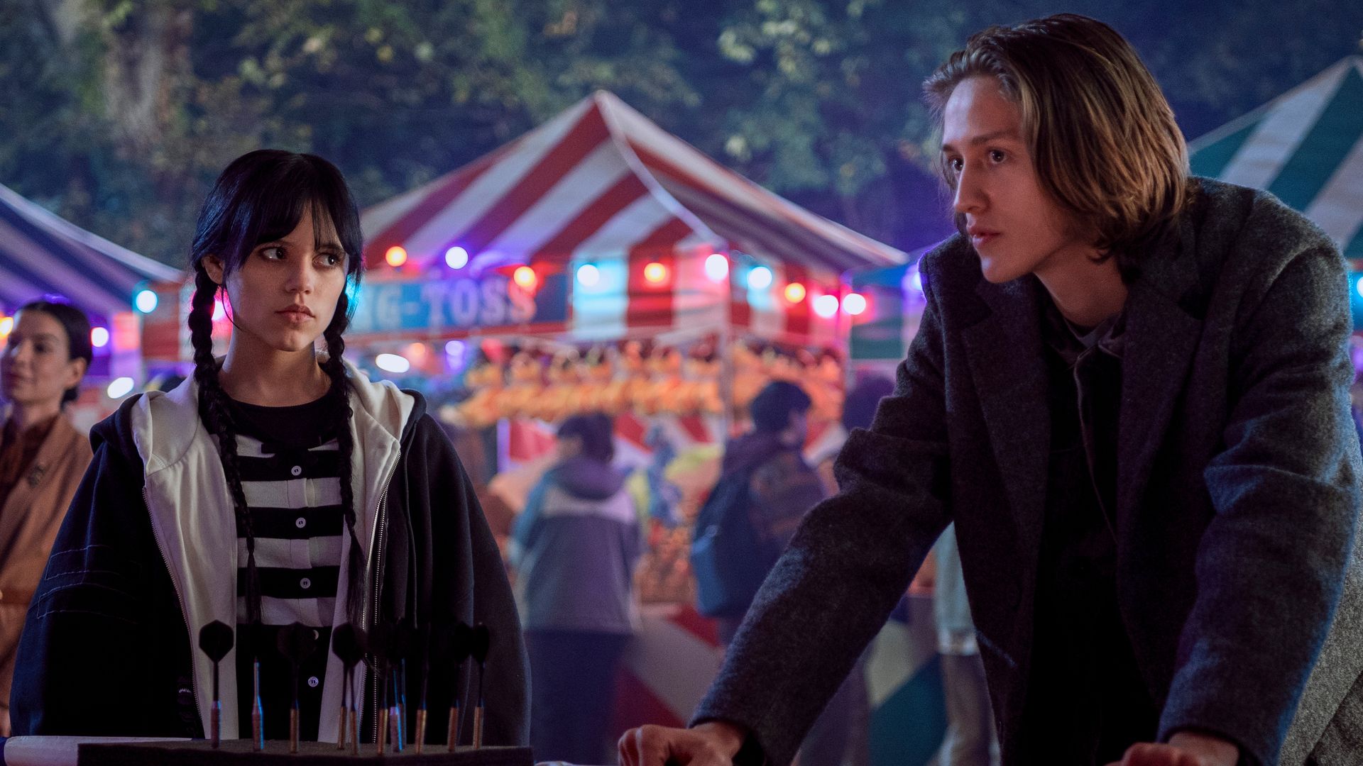 teen girl and teen boy at fun fair