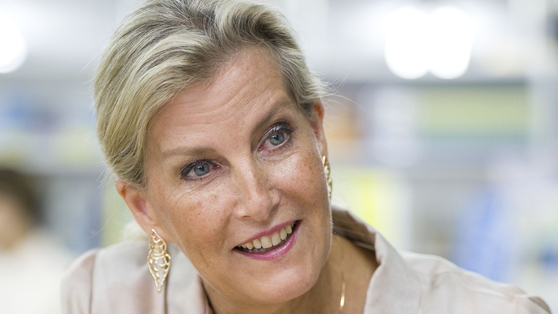 The Duchess of Edinburgh sat down in neutral silk dress