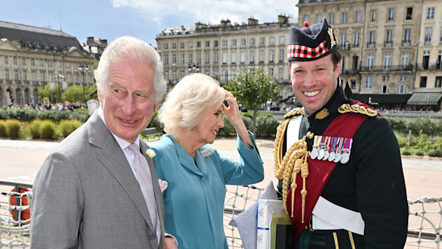 King Charles with Queen Camilla and Major Jonathan Thompson in France