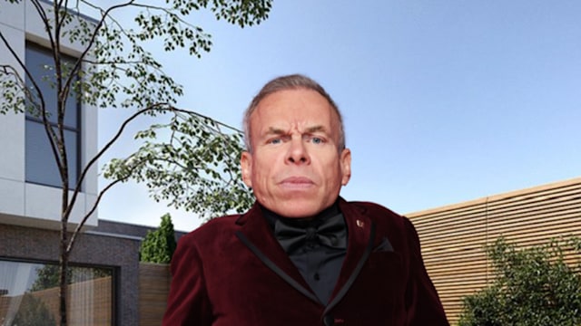 warwick davis in front of home