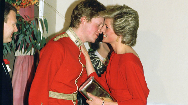 Charles Spencer kissing Princess Diana on the cheek