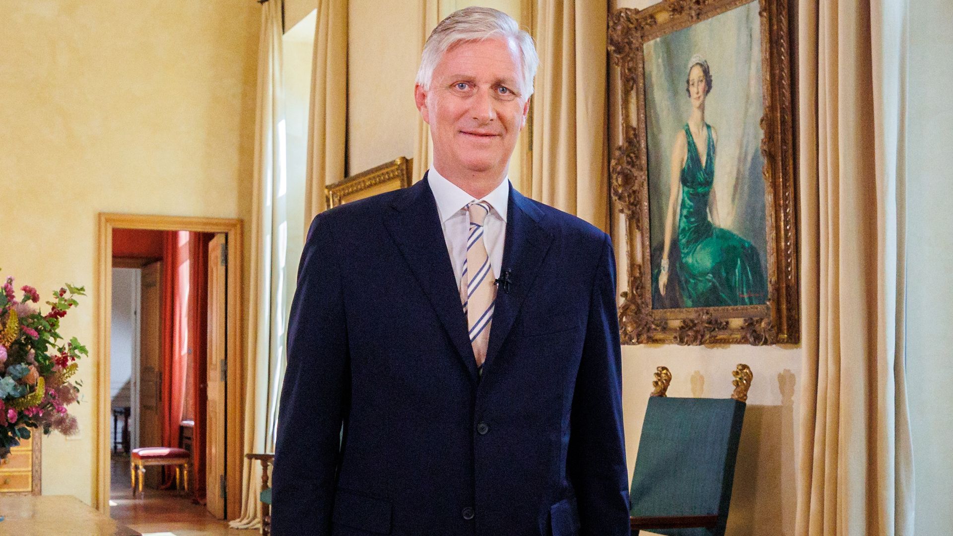 King Philippe of Belgium stood in a palace room