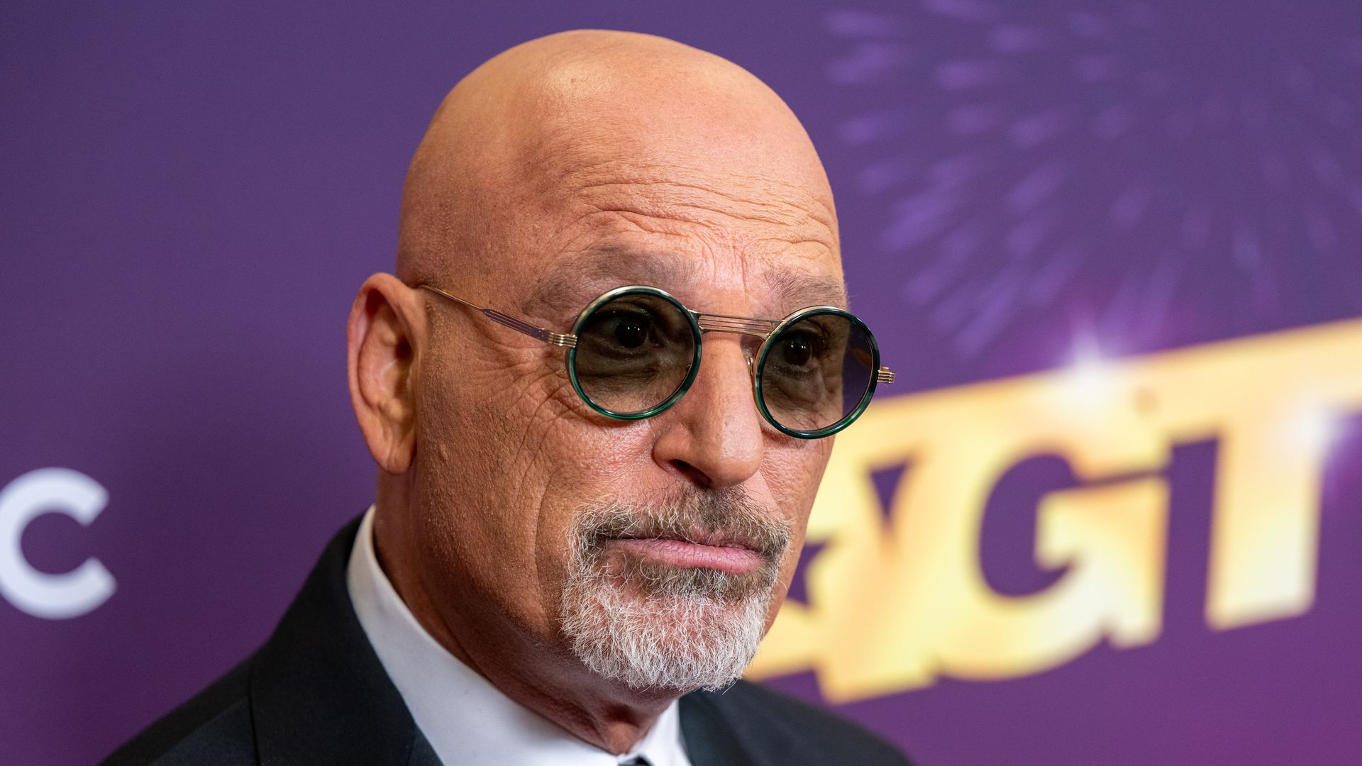 photo of howie mandel wearing glasses