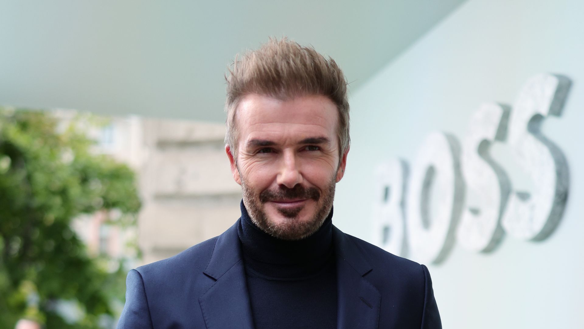 David Beckham wears Victoria’s signature catwalk outfit at Milan Fashion Week