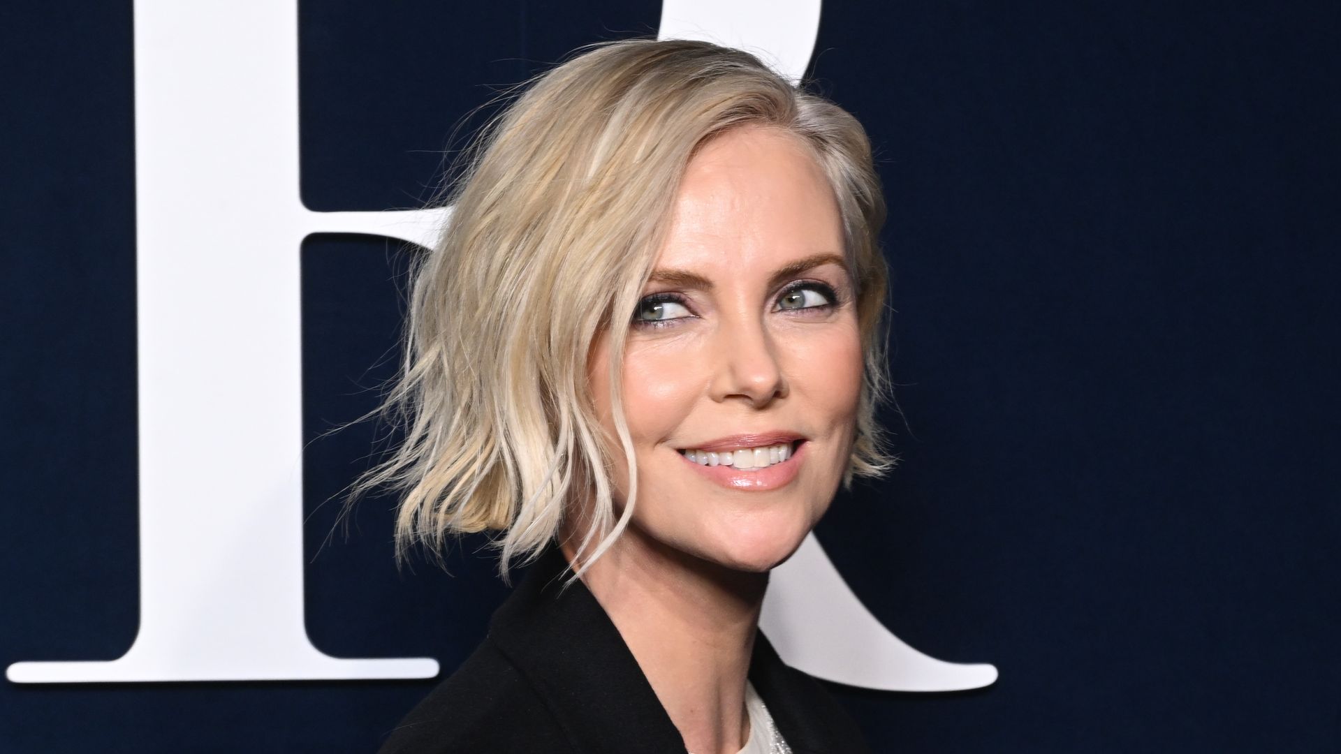 Charlize Theron's appearance confuses fans in throwback photo and wait ...