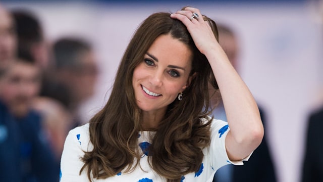 Kate Middleton wearing a white and blue dress at the Hayward Tyler Luton on August 24, 2016 in Luton, England. 
