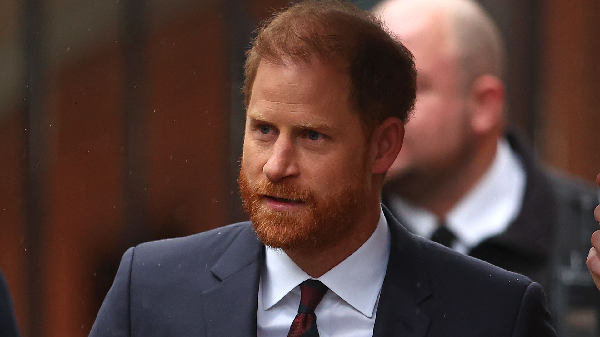 Prince Harry arriving at court to give evidence