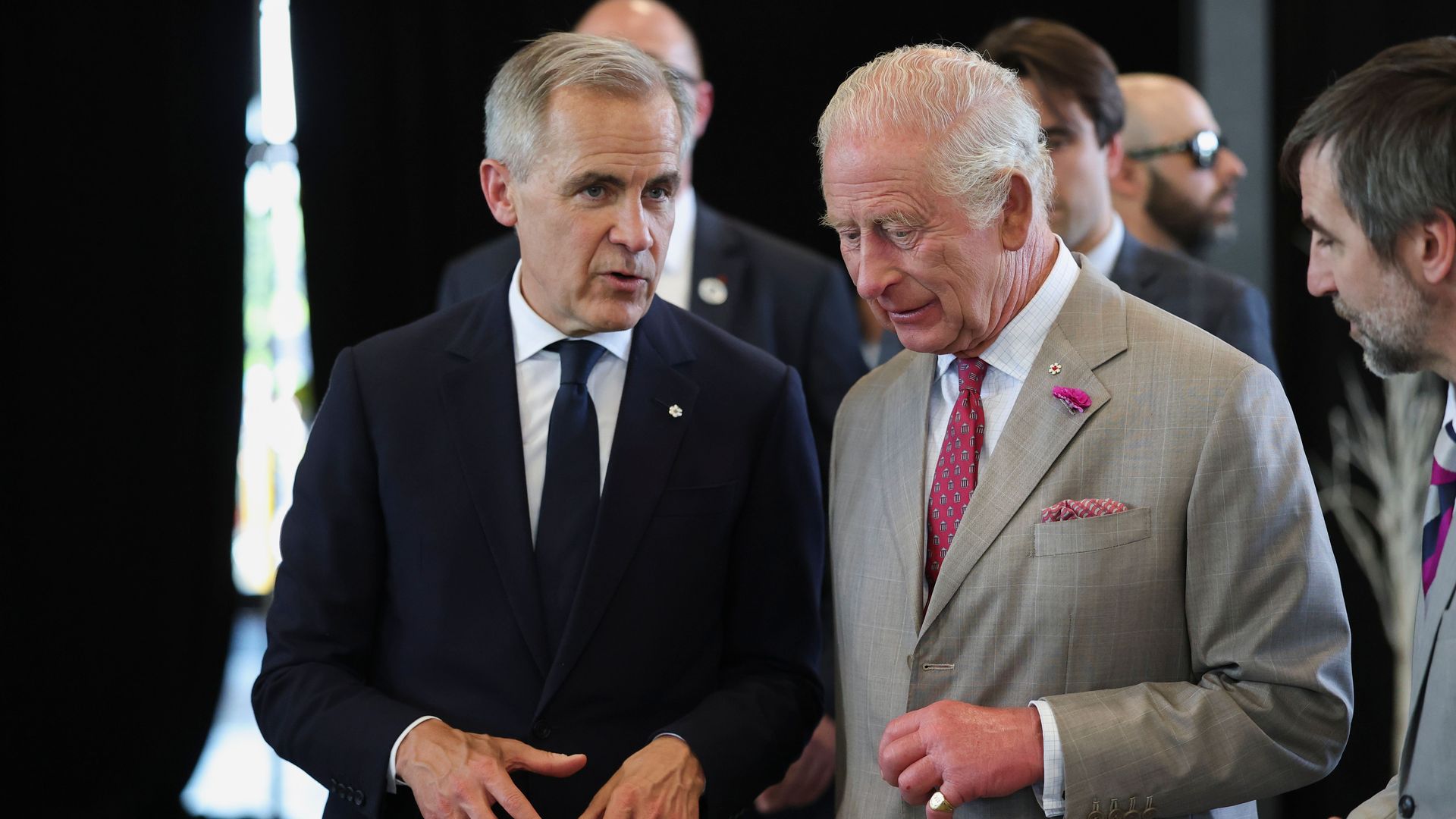 Mark Carney speaking to King Charles