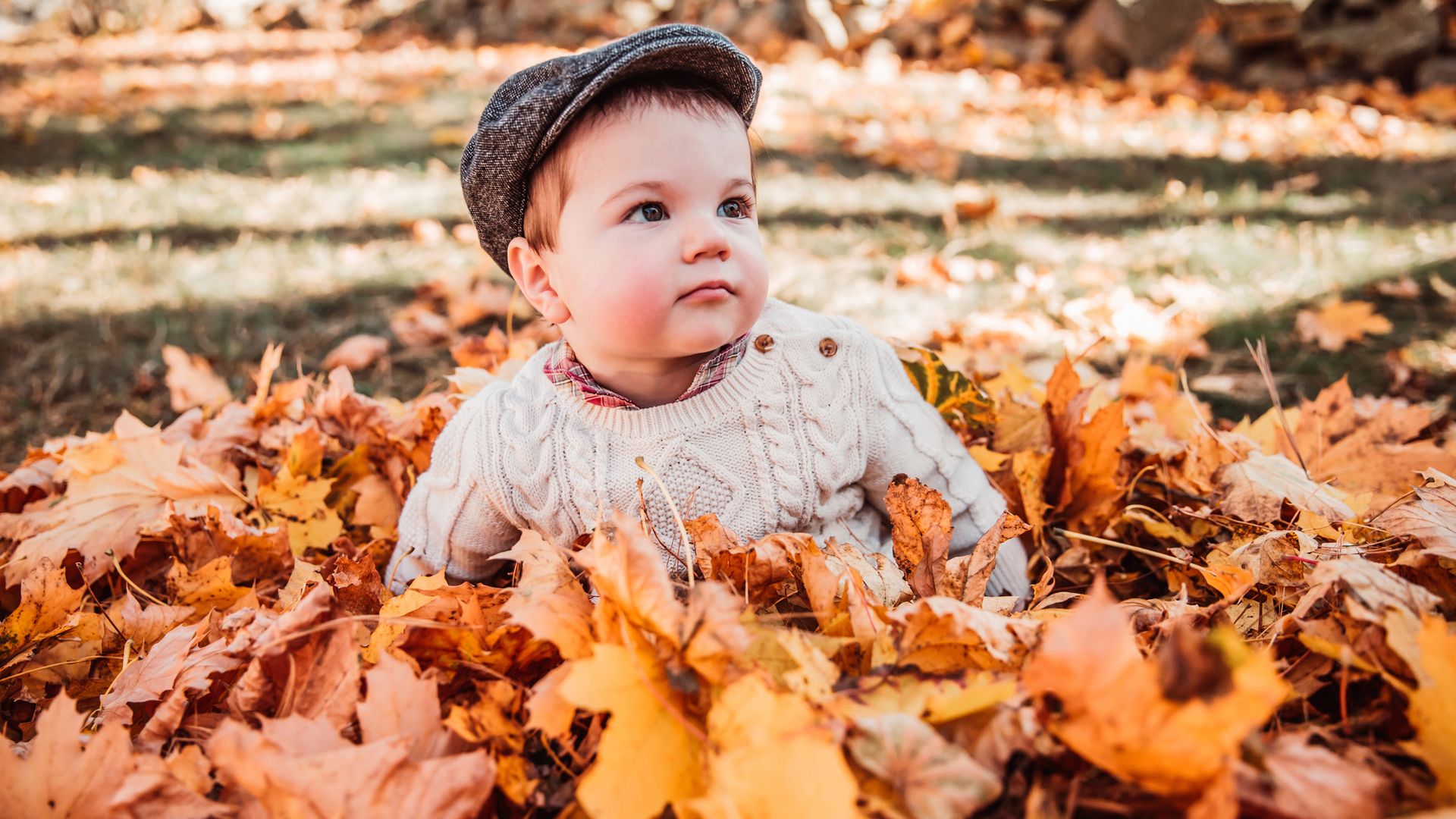 Natural light portrait. Retro child wearing a hat.