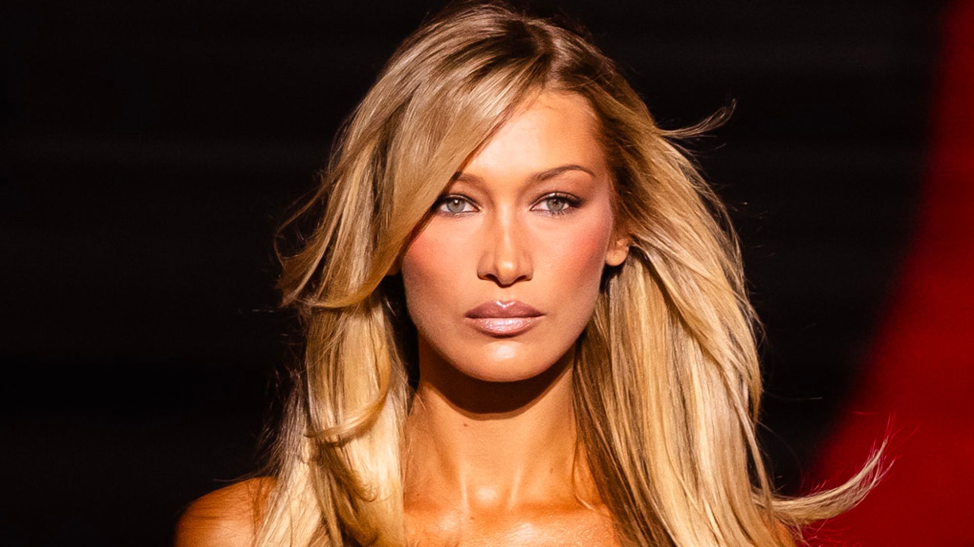 Bella Hadid just matched her glasses to her £79 off-the-shoulder festive top