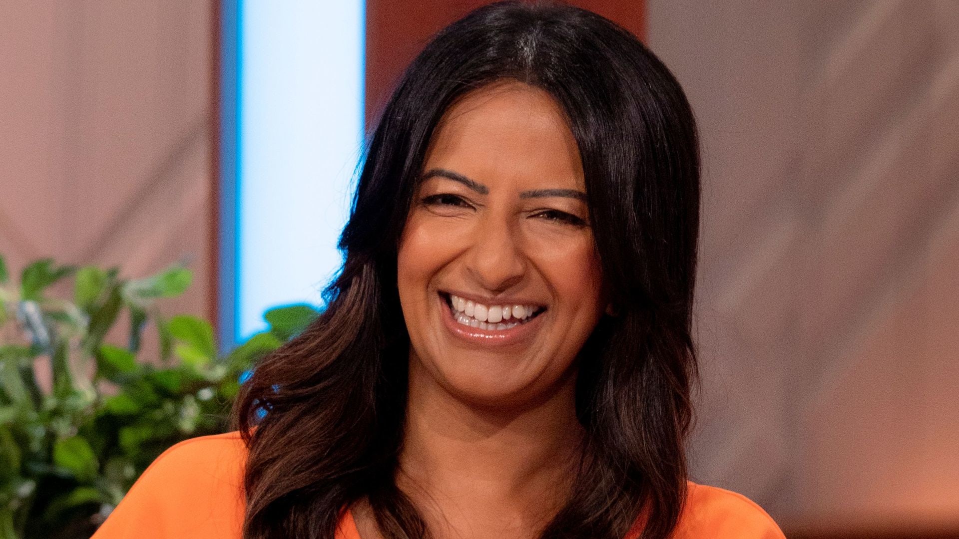 Ranvir Singh wears an orange dress on Lorraine