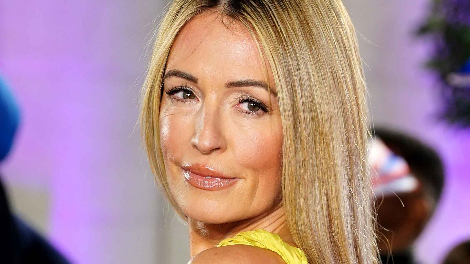 Cat Deeley's wearing the off-duty mum aesthetic I live in - a striped shirt and jeans