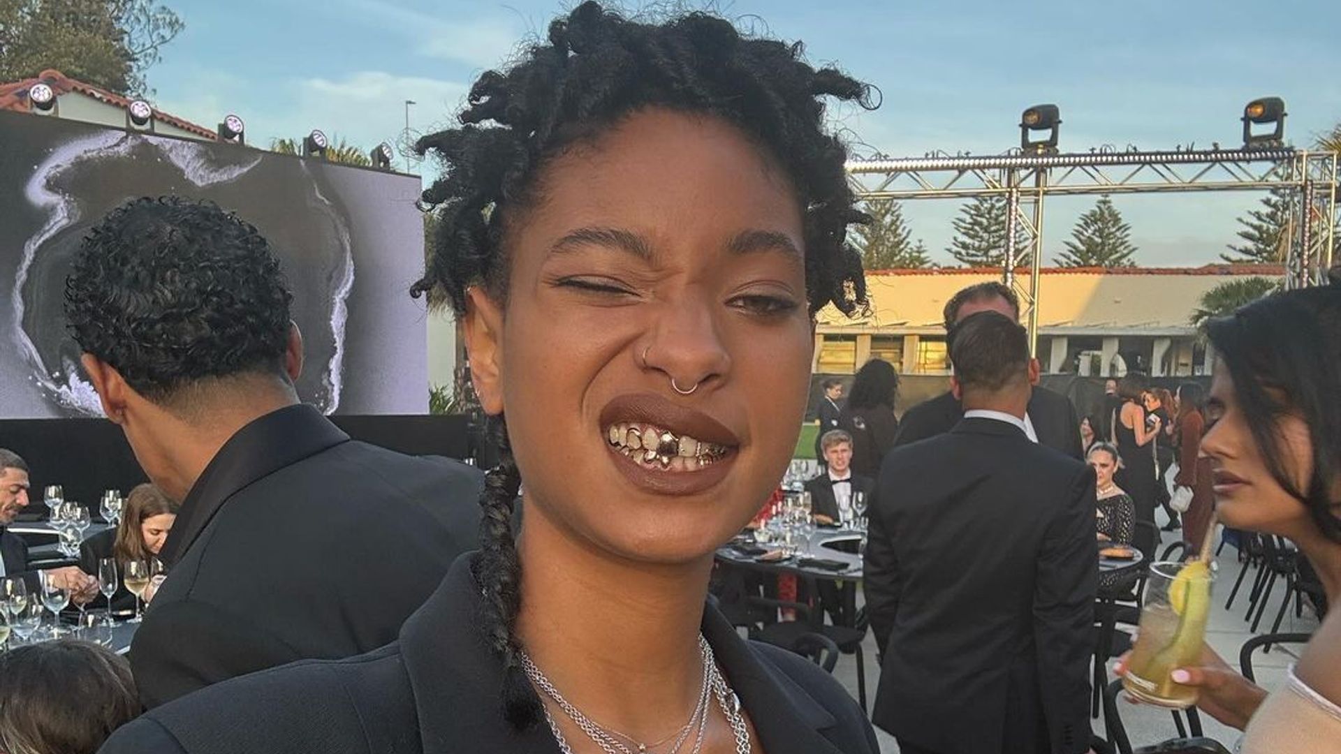 Willow Smith sporting her rose gold grillz 