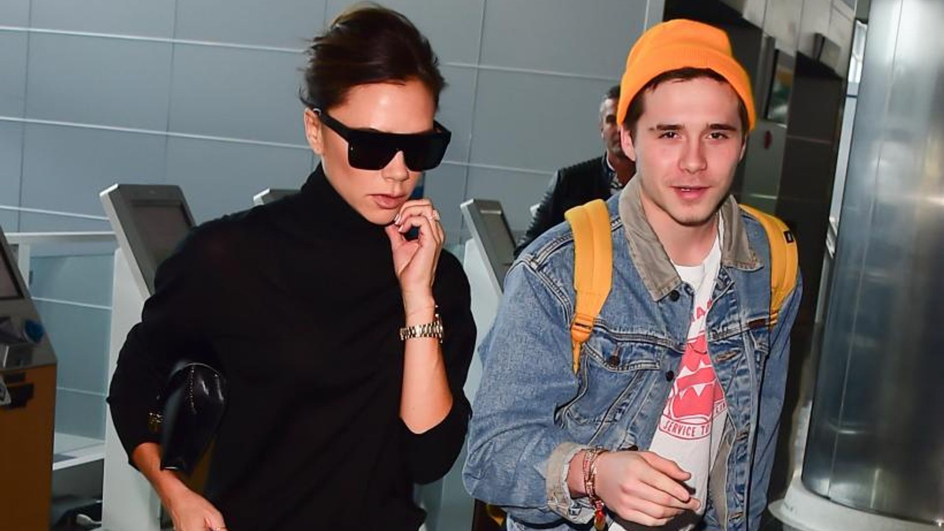 victoria beckham and son brooklyn at airport