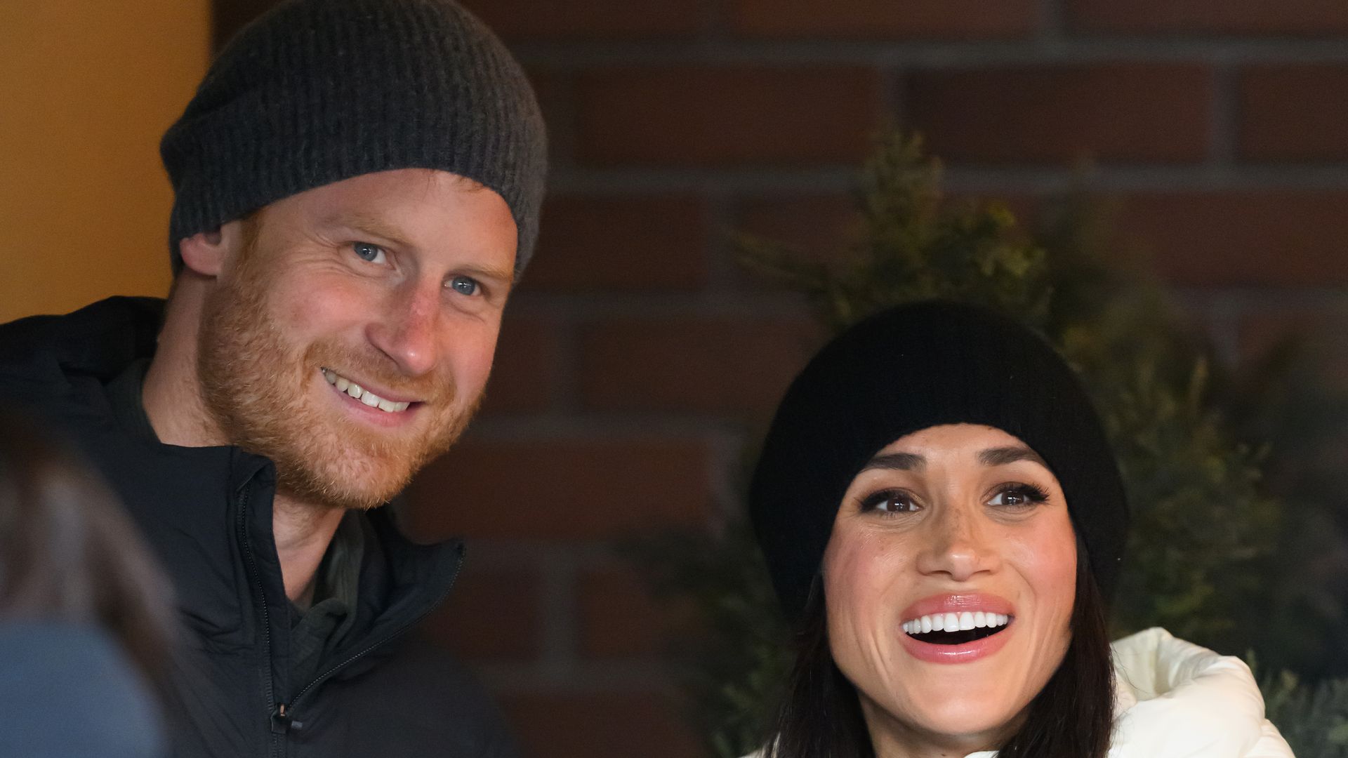 Prince Harry and Meghan Markle wearing winter clothing