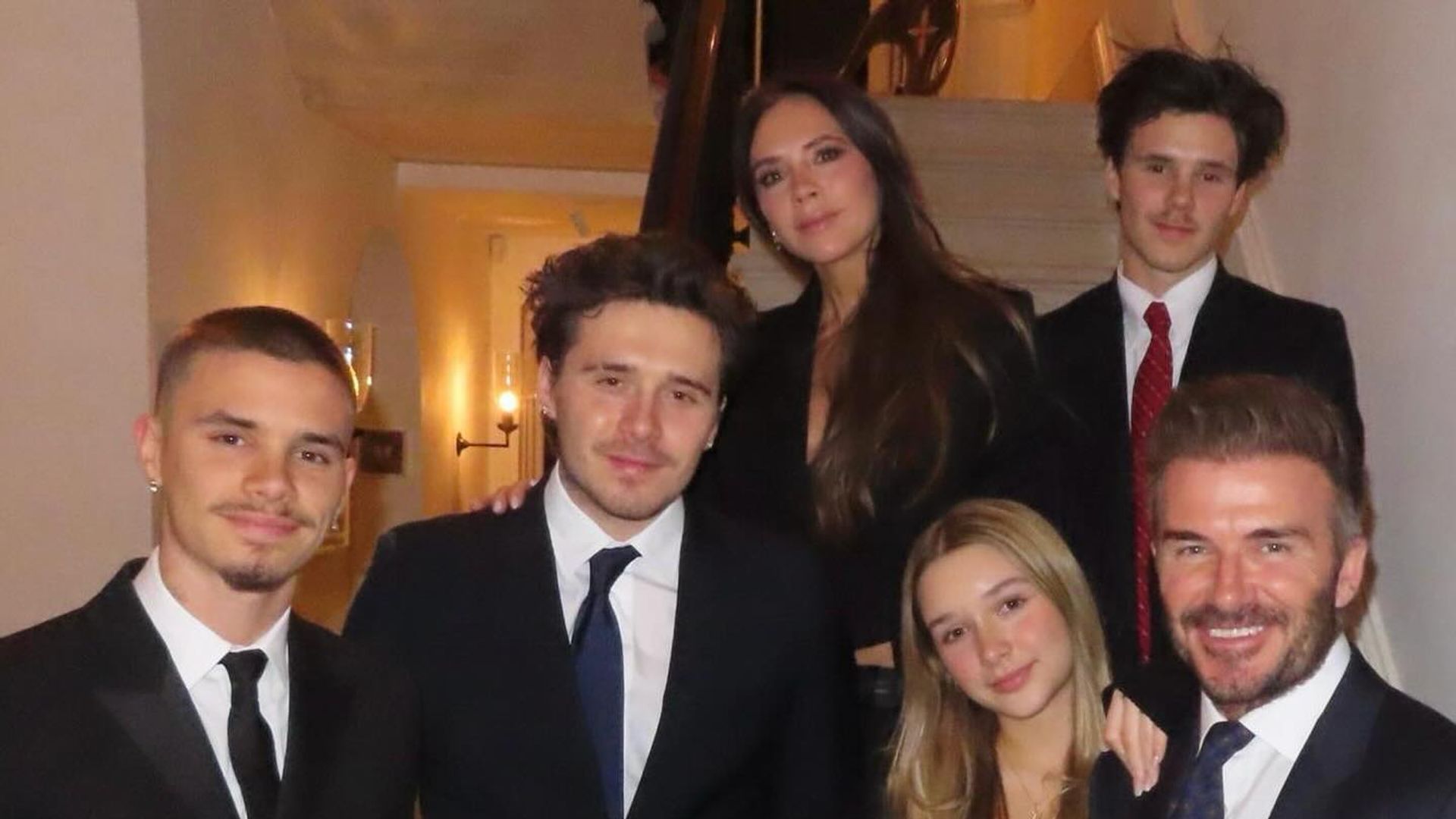 beckham children standing on stairs 