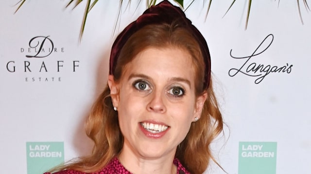  Princess Beatrice poses in pink dress