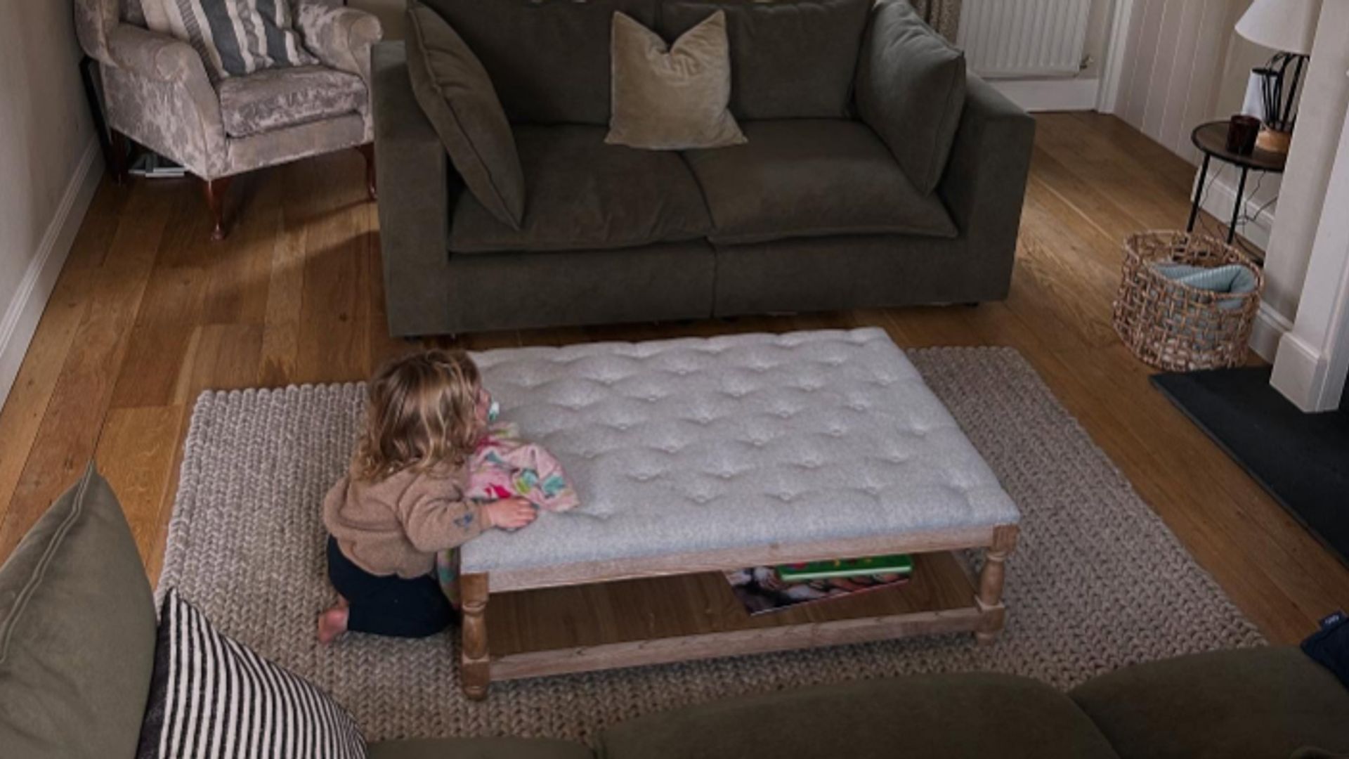 A young girl in a living room