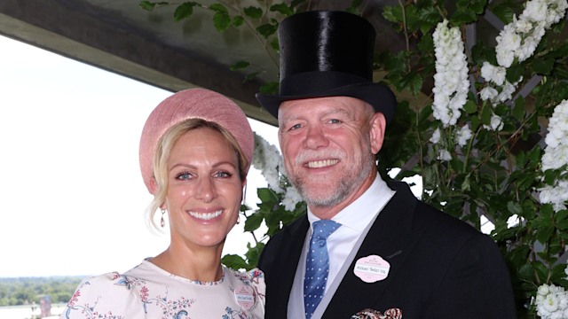 Zara Tindall in a floral dress with Mike Tindall in a black suit