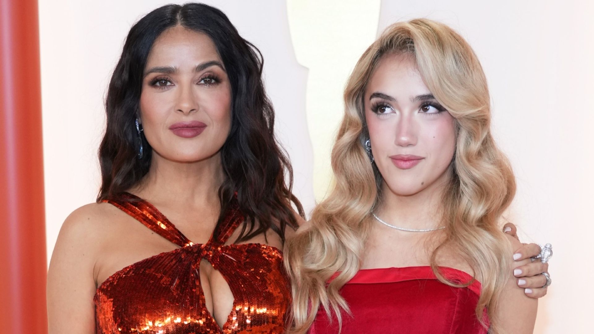 Salma Hayek and lookalike daughter Valentina twin in redhot gowns at