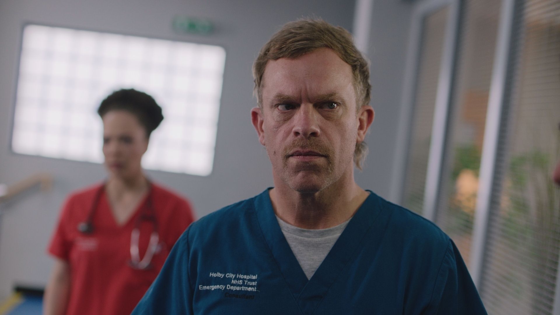 William Beck as Dylan Keogh in a hospital in Casualty