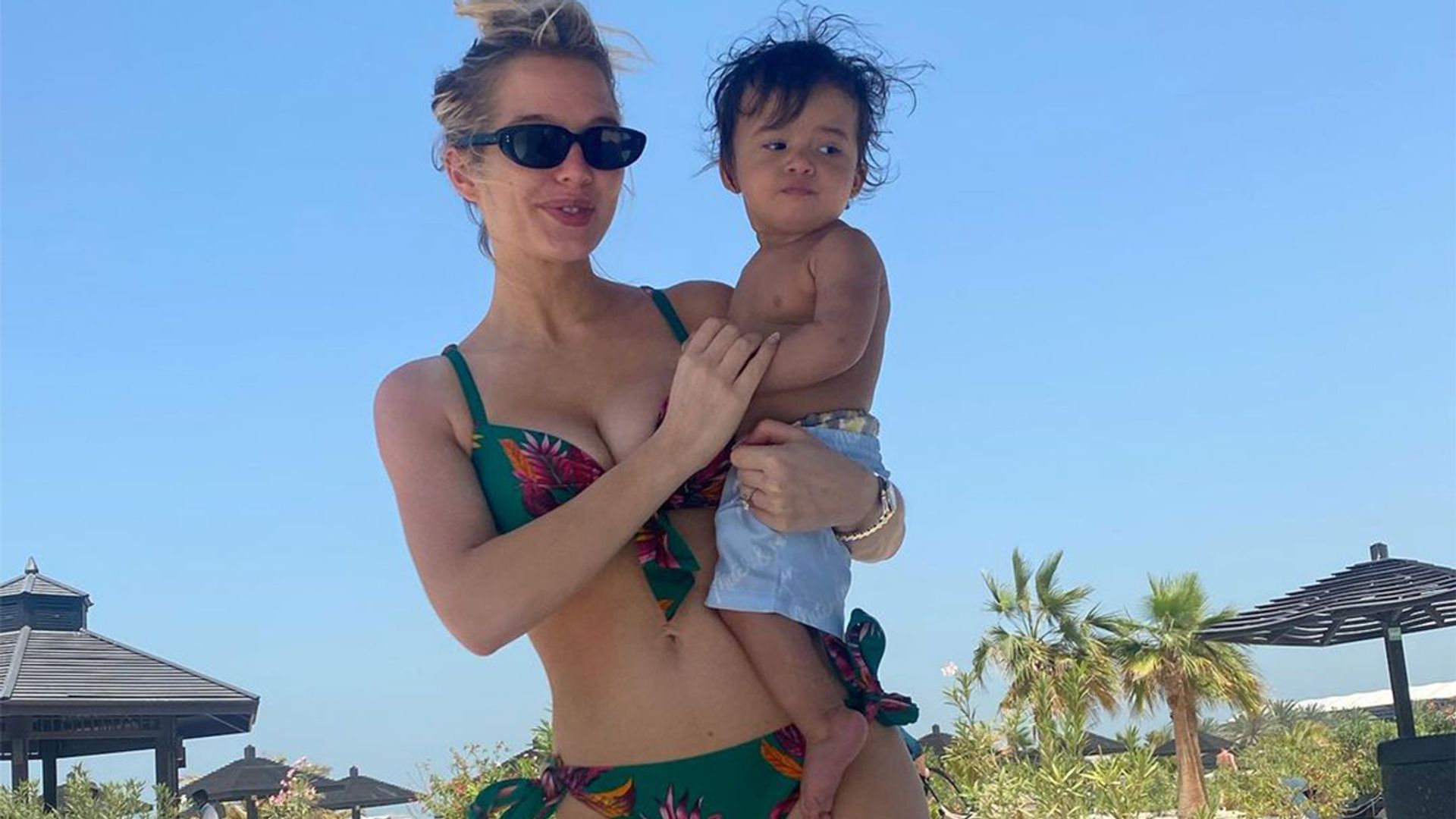 Helen Flanagan wows in floral green bikini as she holds her son Charlie
