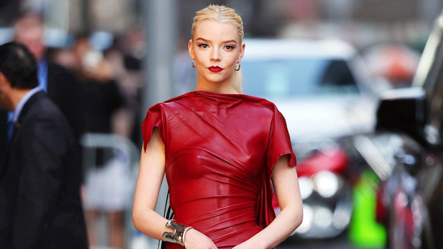 Anya Taylor-Joy in red leather dress and heels