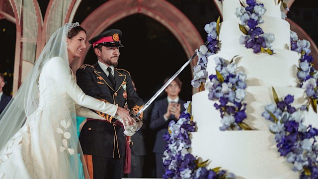 Prince Hussein and Princess Rajwa with their seven-tier royal cake