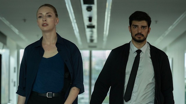 Ayse Farsakoglu (Yasemin Kay Allen), Mehmet Suleyman (Ethan Kai) in The Turkish Detective