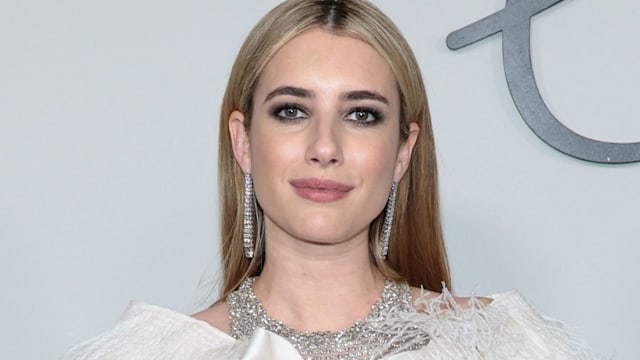 Emma Roberts in a white jewelled dress