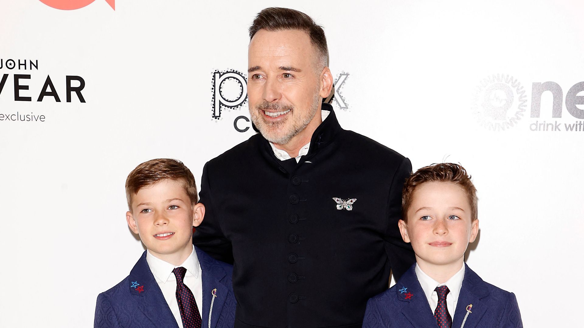 David Furnish with his two sons in 2022