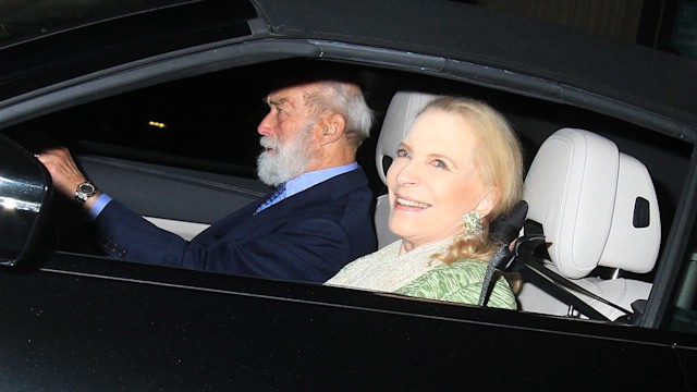 Princess Michael of Kent smiles as Prince Michael drives