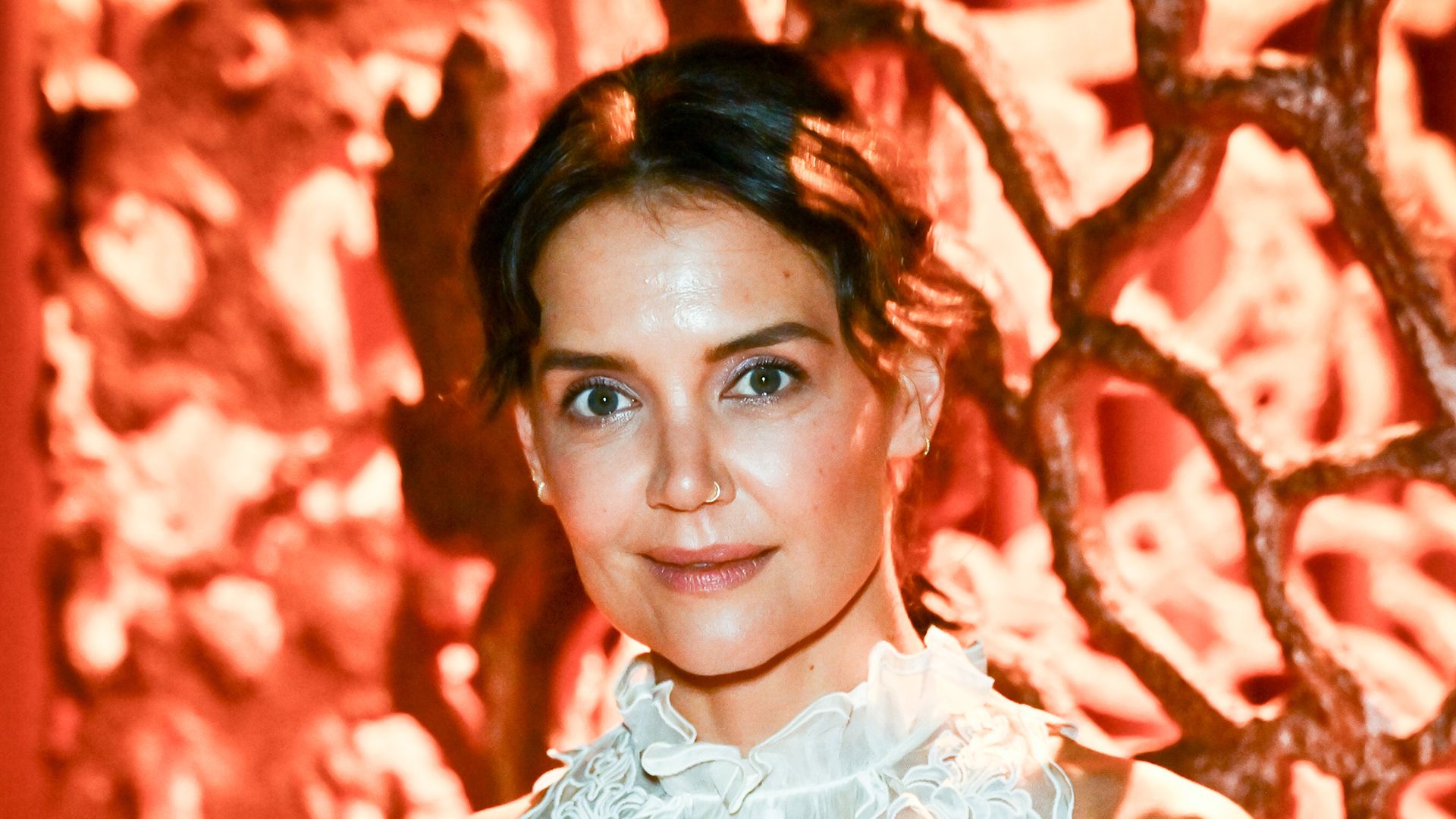 Katie Holmes wearing a white blouse at the Ulla Johnson show 