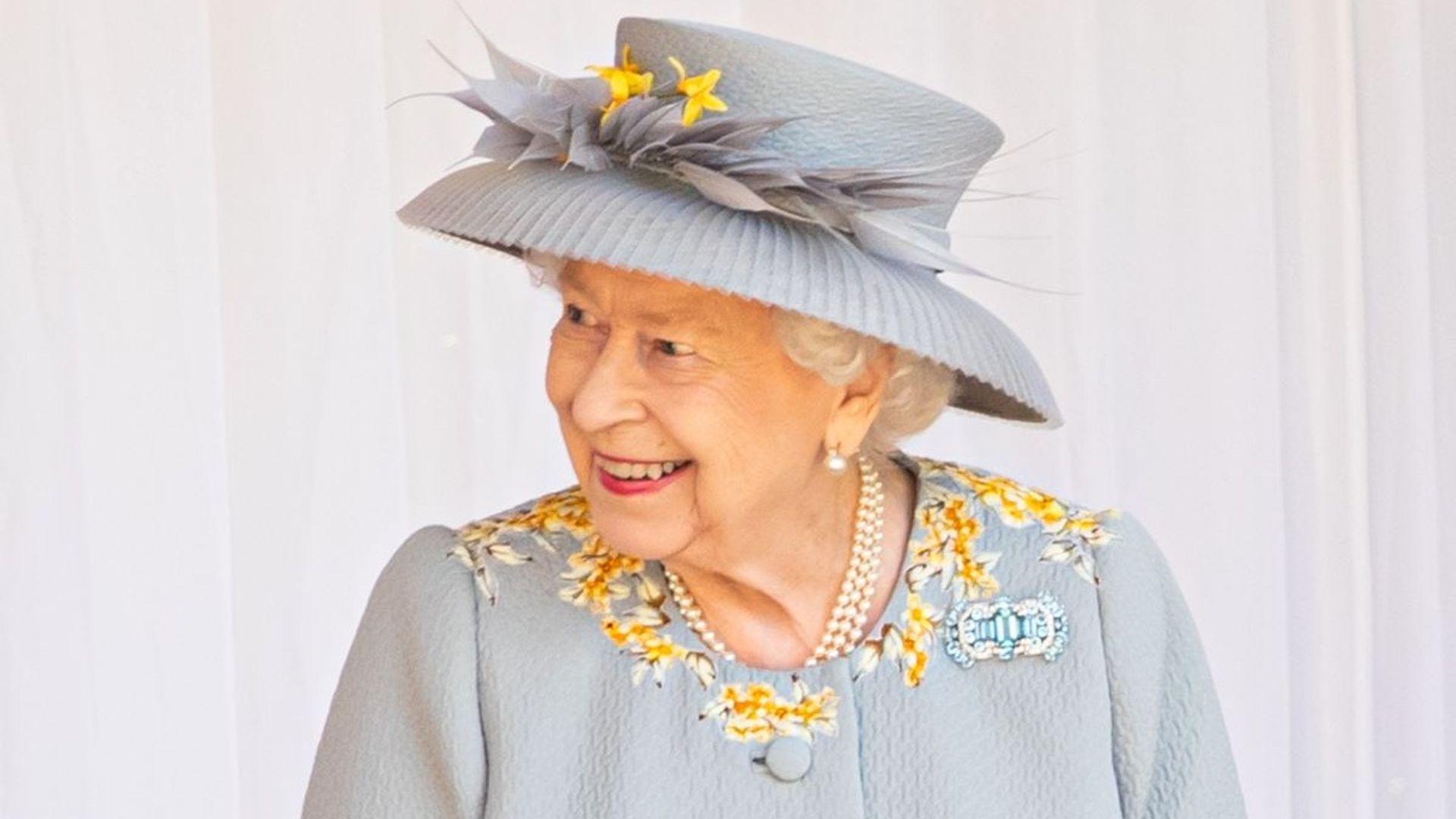 the queen trooping colour smiling