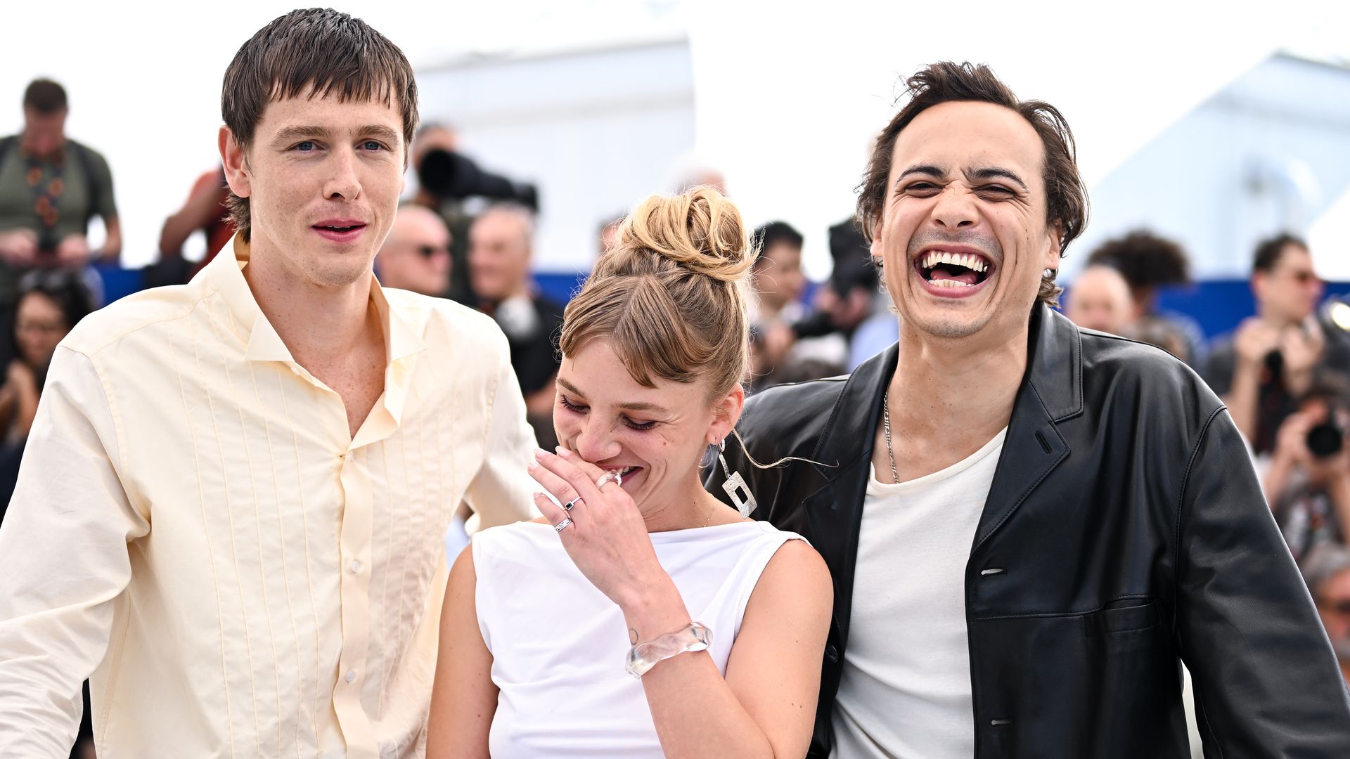 Harris Dickinson, Meghan Northam and Frank Dillane laughing together