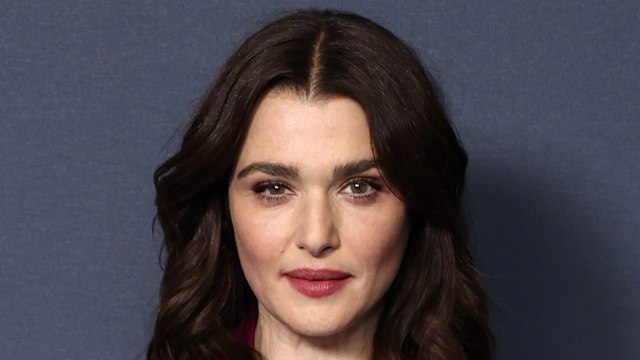 Rachel Weisz wearing magenta velvet suit 