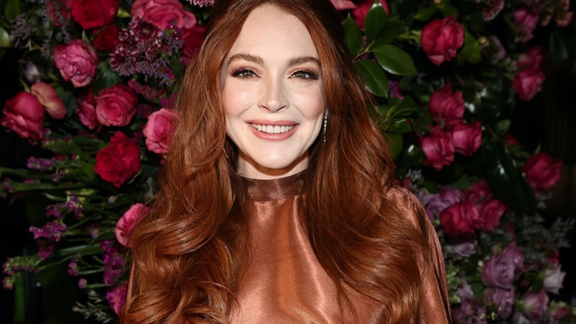 Lindsay Lohan attends the Christian Siriano Fall/Winter 2023 fashion show on Feb. 9, 2023, in New York. (Jamie McCarthy/New York Daily News/Tribune News Service via Getty Images)