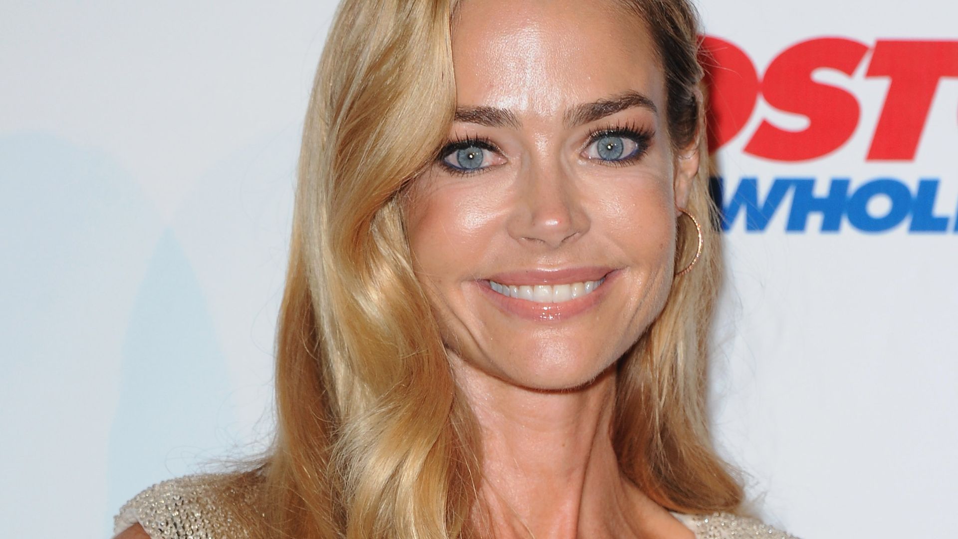 Denise Richards looks sensational in sheer dress and heels - and fans all have the same reaction