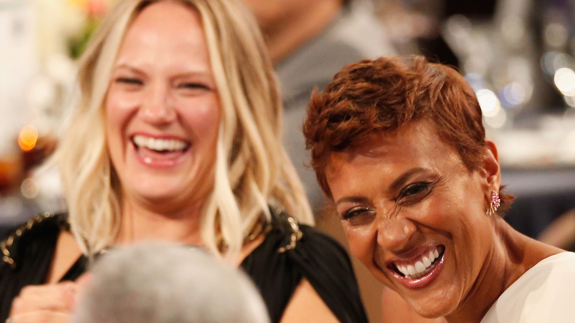 Robin Roberts and Amber Laign smiling dinner