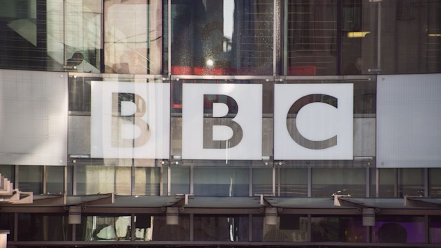 The BBC logo is seen at the entrance at Broadcasting House, the BBC headquarters in central London.