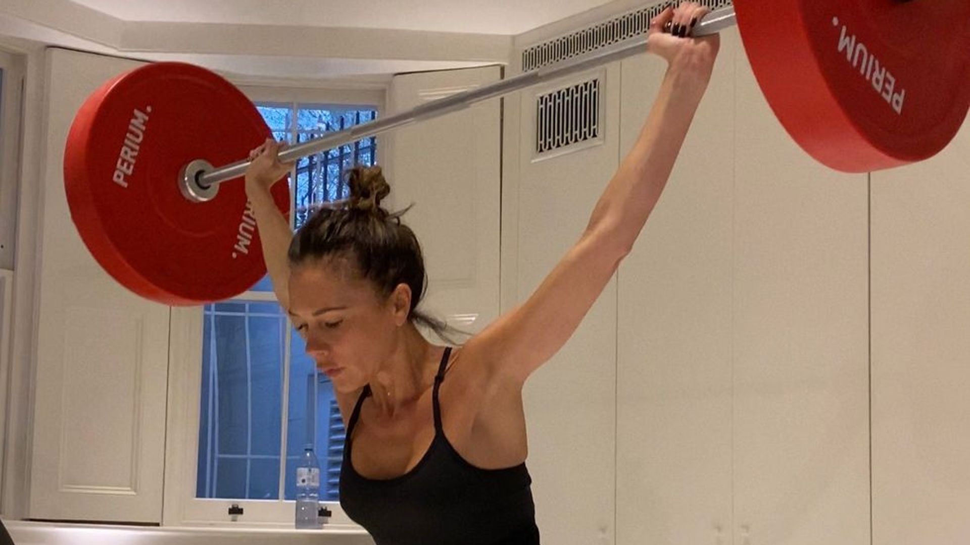 Victoria Beckham lifting weights