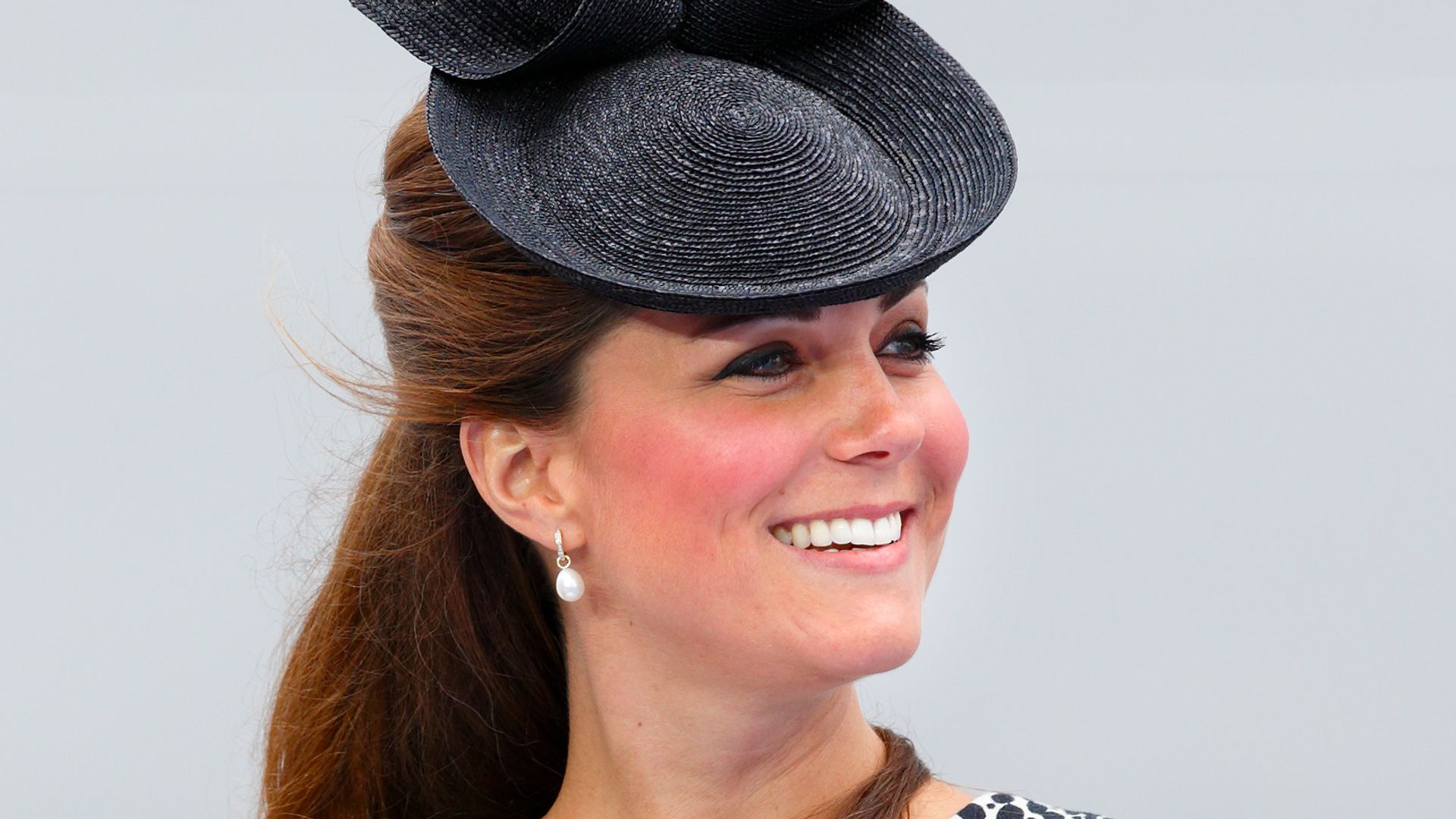 Catherine in dalmatian print dress shoulders up