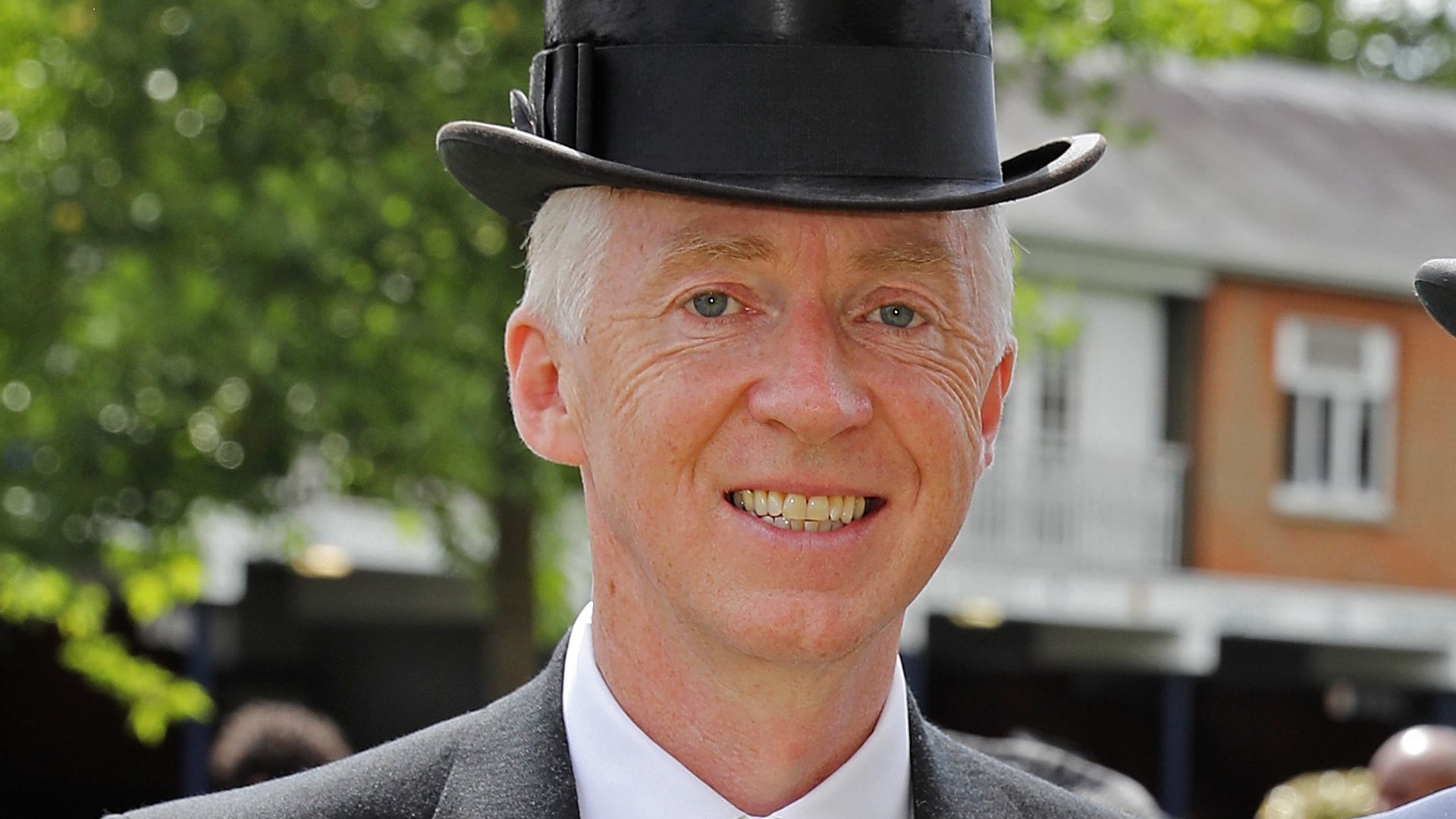 Philip Treacy in a tailcoat and top hat 